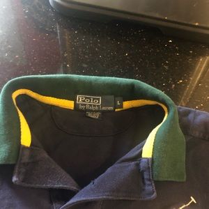 Navy blue polo with green and yellow  collar
